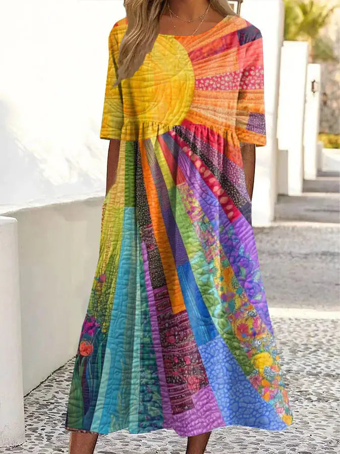 Colorful patterned dress worn by a person on a white background